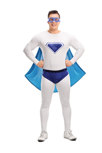 Молодой гордый супергерой в синем плаще
  - Фото, изображение