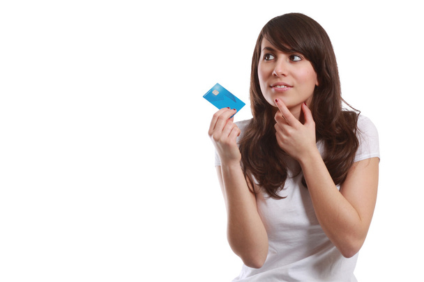 Isolated young girl with credit card - Foto, Imagen