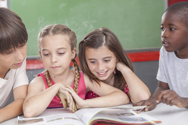 Pupils reading  at school - Photo, Image