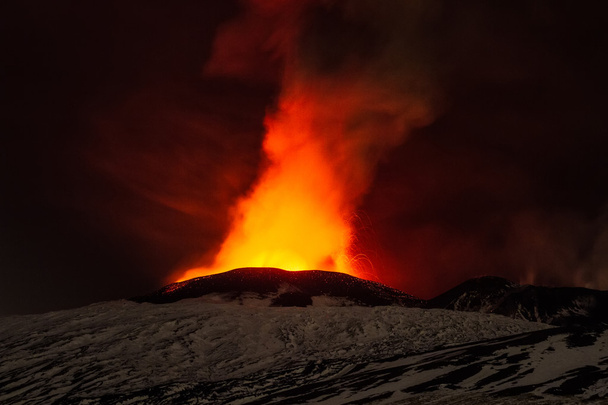 Volcano eruption. Mount Etna erupting from the crater Voragine - Photo, Image