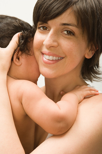 Мать и ребенок в ее руках
 - Фото, изображение