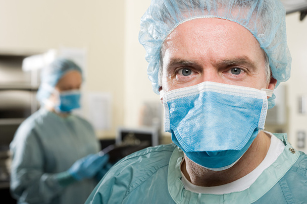 Surgeons in operating theatre - Photo, Image