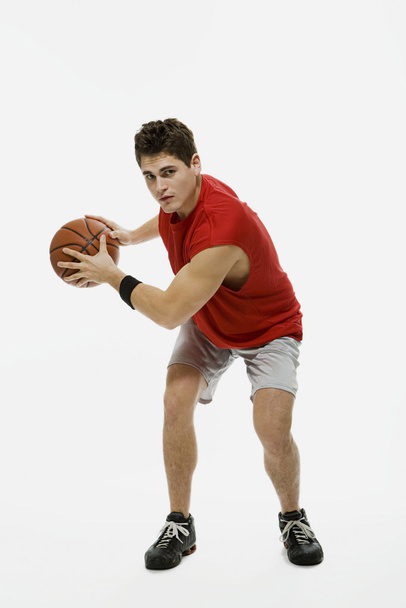 Kosárlabda játékos a labda pózol - Fotó, kép