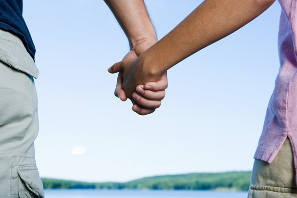 Couple holding hands - Foto, afbeelding