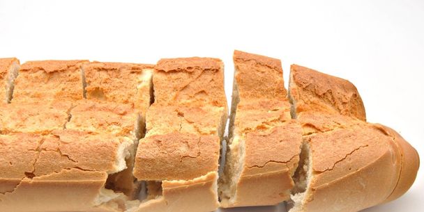 ekmek parçalarını kesmek - Fotoğraf, Görsel