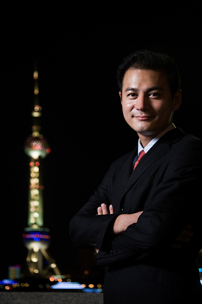 Businessman and the oriental pearl tower - Photo, Image