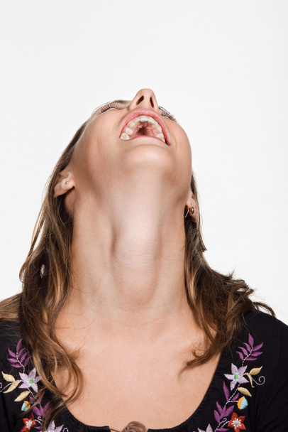 молода жінка з головою спиною сміється
 - Фото, зображення