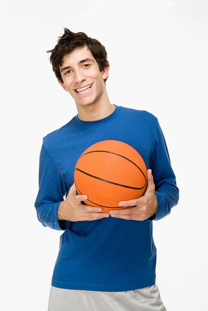 Adolescente con un baloncesto
 - Foto, Imagen