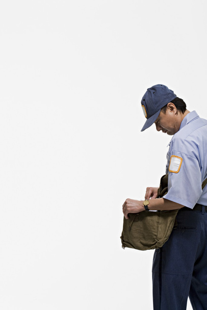 Portrait of a asian male postman - Φωτογραφία, εικόνα