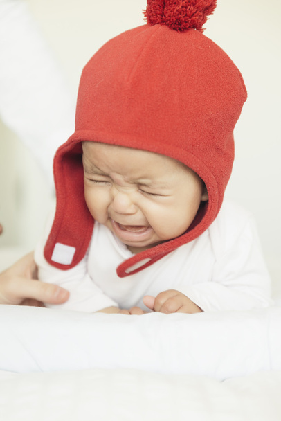 Cute Baby Girl Crying  in the Crib - Valokuva, kuva