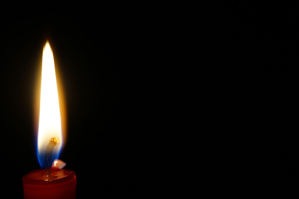 burning candle isolated on black - Photo, Image