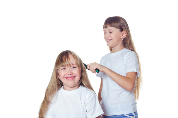 Дівчата грають перукарню
 - Фото, зображення