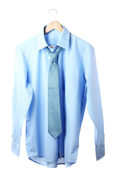 Blue shirt and tie on wooden hanger isolated on white - Valokuva, kuva