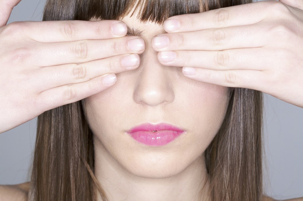 woman covering one eyes - Photo, Image