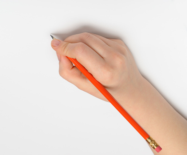 Hand with red pencil - Foto, Imagem