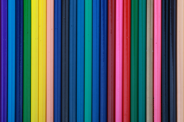 Colorful color pencil arranged in diagonal line on white background - Foto, immagini