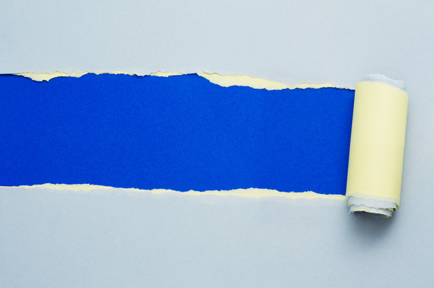 Torn blue and yellow paper with space for text - Foto, immagini