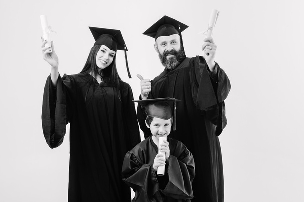 Successful three college different age graduates. - Photo, Image