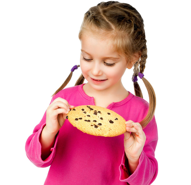 Menina com biscoitos chip
 - Foto, Imagem
