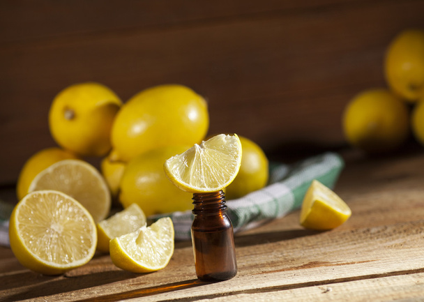 Lemon essential oil - Фото, изображение