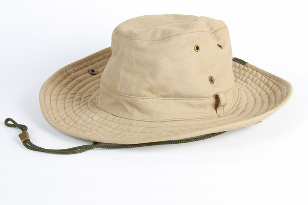 Un grand chapeau de soleil beige avec dentelle sur fond blanc
 - Photo, image