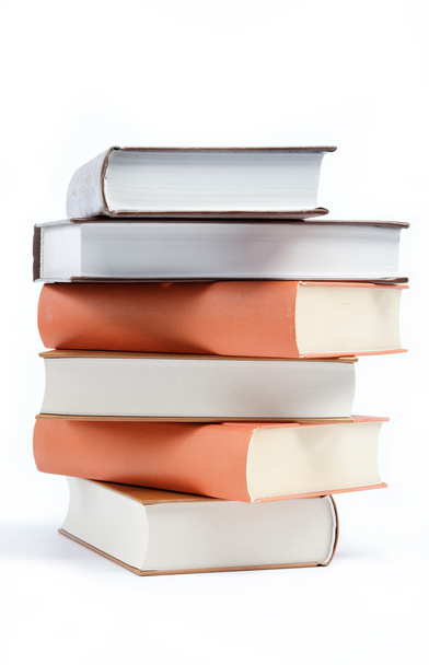 A stack of books on a white background. - Foto, imagen