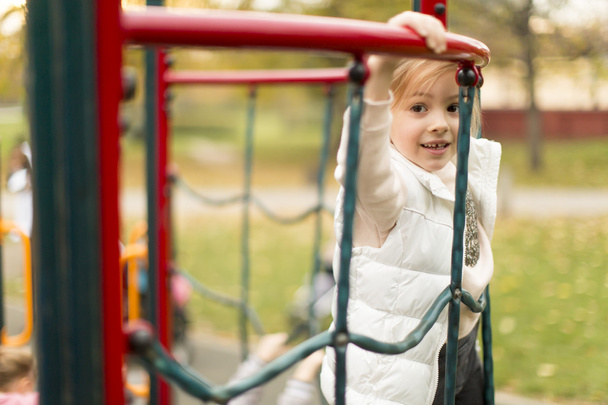 Little girl at playground - Fotó, kép
