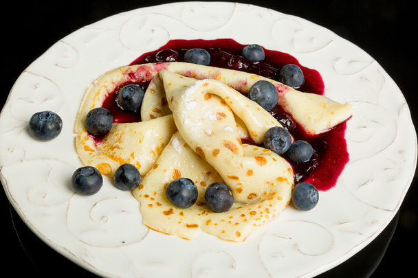 Pancake with blueberry sauce - Foto, afbeelding