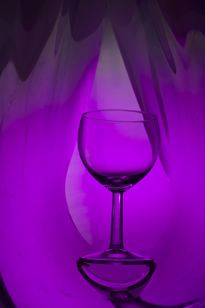Wine glass on an abstract colored background - Photo, image
