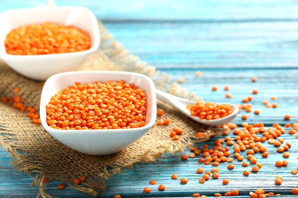Red lentils in bowl - Φωτογραφία, εικόνα
