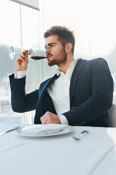 Wine. Man Tasting Wine. Businessman Drinking In Restaurant. Cele - Foto, Imagem