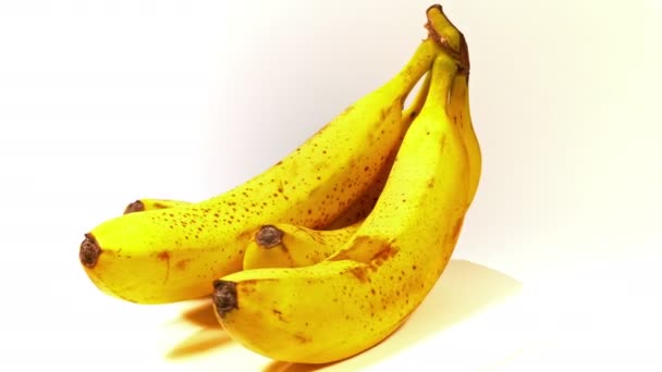 Looped: bunch of ripe tasty yellow bananas spinned - Footage, Video