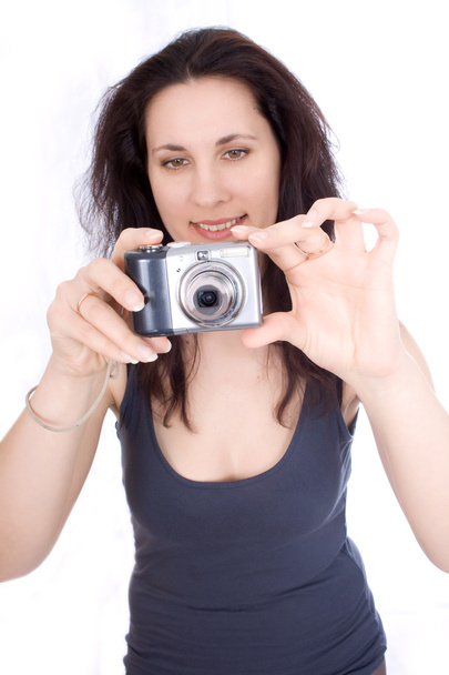 Woman with a camera takes - Photo, Image