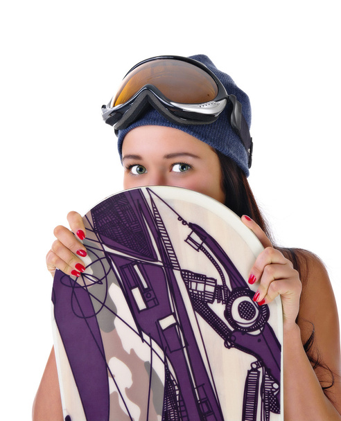 Young girl looks out for snowboard - Fotó, kép