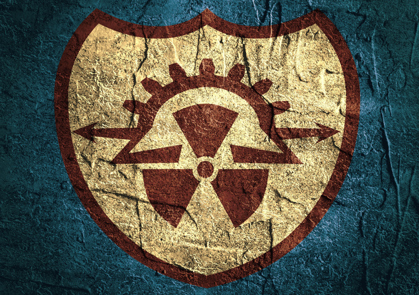 flat shield and nuclear danger icons on concrete textured background  - Фото, зображення
