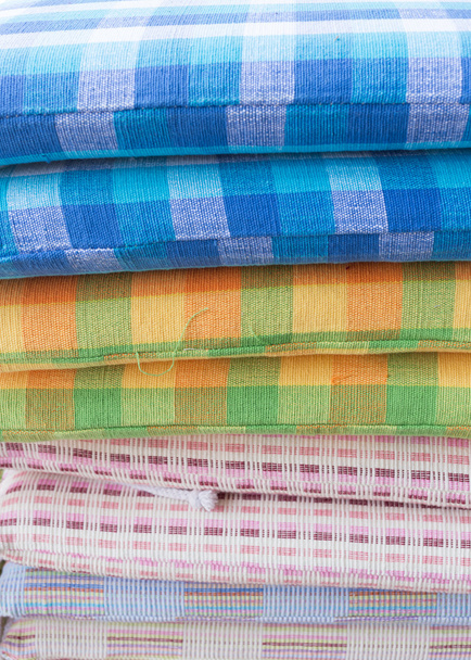 heap of cloth fabric in retail shop - Photo, Image