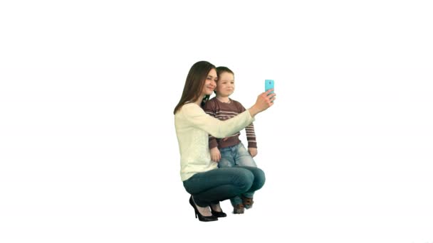 Mother And Son Posing For Selfie  on white background isolated - Footage, Video