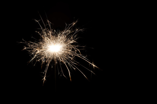 One buring sparkler - Foto, Imagen