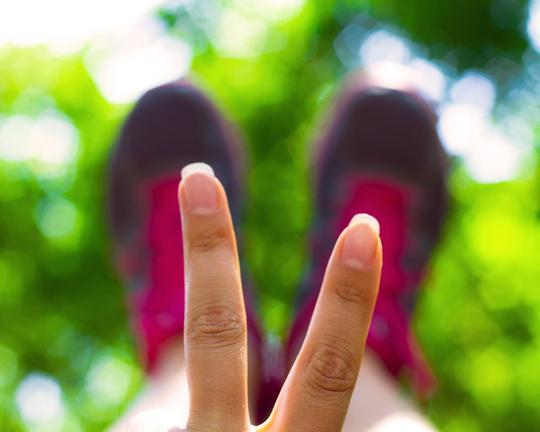 Photo Of  hand young girl with Victory Sign - 写真・画像