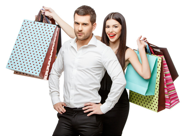 Couple with shopping bags - Фото, изображение