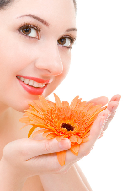 Young woman with gerber flower - Zdjęcie, obraz
