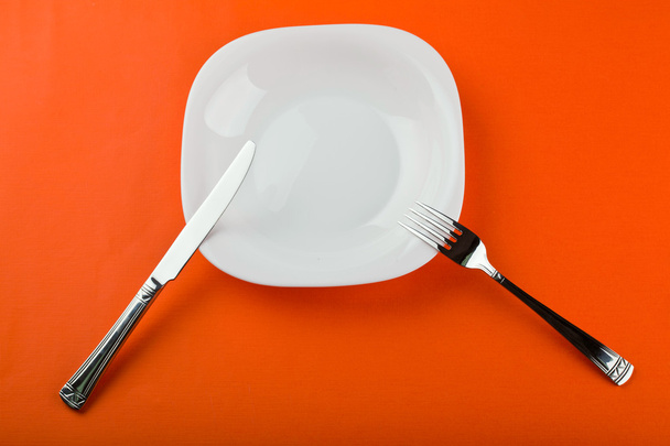 Plate with fork and knife - 写真・画像