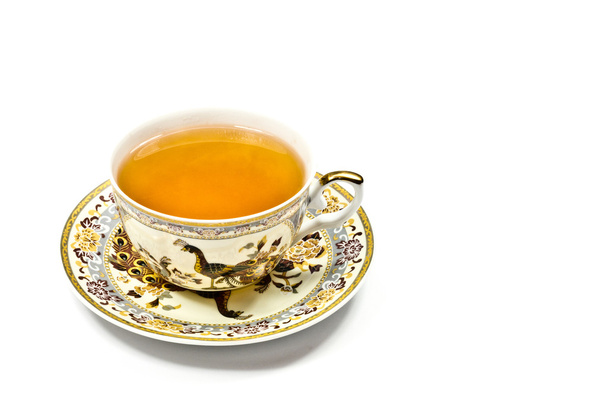 a klasszikus arany-peremes Kína teáscsésze és csészealj. elszigetelt fehér. - Fotó, kép