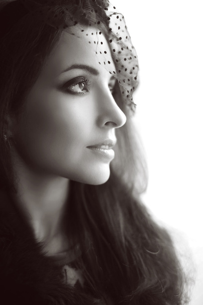 Retro portrasit of  Elegant brunette woman in hat with veil look - Фото, зображення