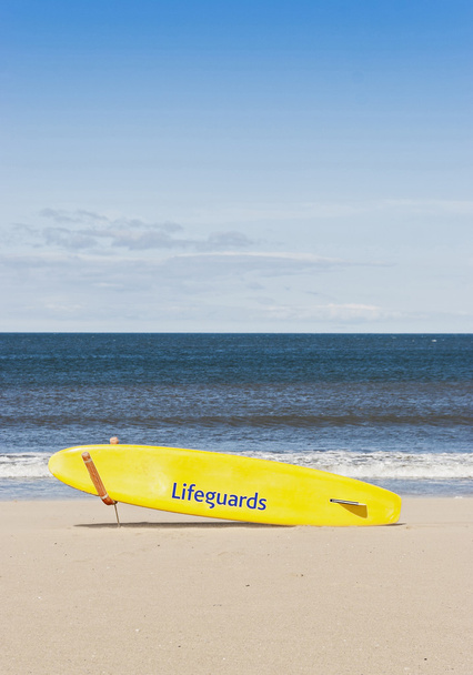 Lifeguard surfboard  on beach - Photo, Image