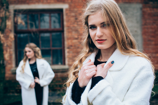 beautiful girls in white coats - Photo, Image