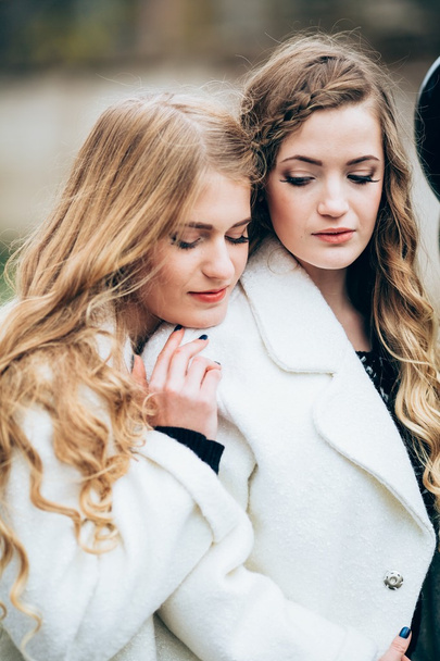 beautiful girls in white coats - Photo, Image