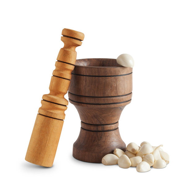 Fokhagymát és a fából készült habarcs - Fotó, kép