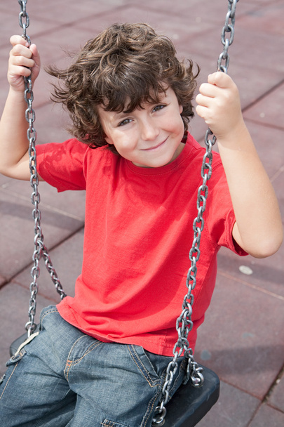 Happy child on the swing - Photo, Image