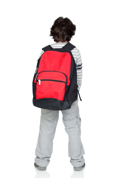 Criança anônima de volta com um pacote pesado
 - Foto, Imagem